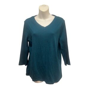 Chico’s houndstooth top in a tealish blue color and black. Size 2 or large